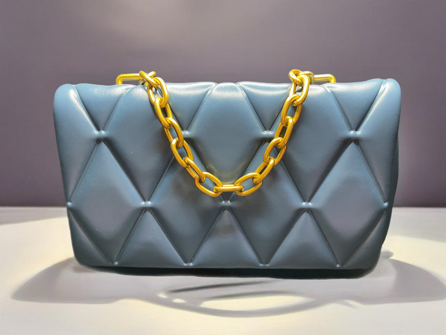 Quilt around small crossbody purse